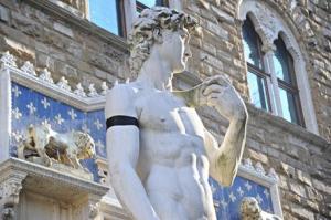 Michelangelo's David in mourning in Signoria Square in Florence