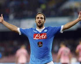 Napoli's Higuain celebrates after scoring against Palermo's during their Serie A soccer match at San Paolo stadium in Napoli