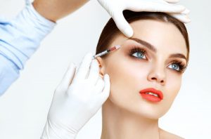Beautiful woman gets injections. Cosmetology. Beauty Face